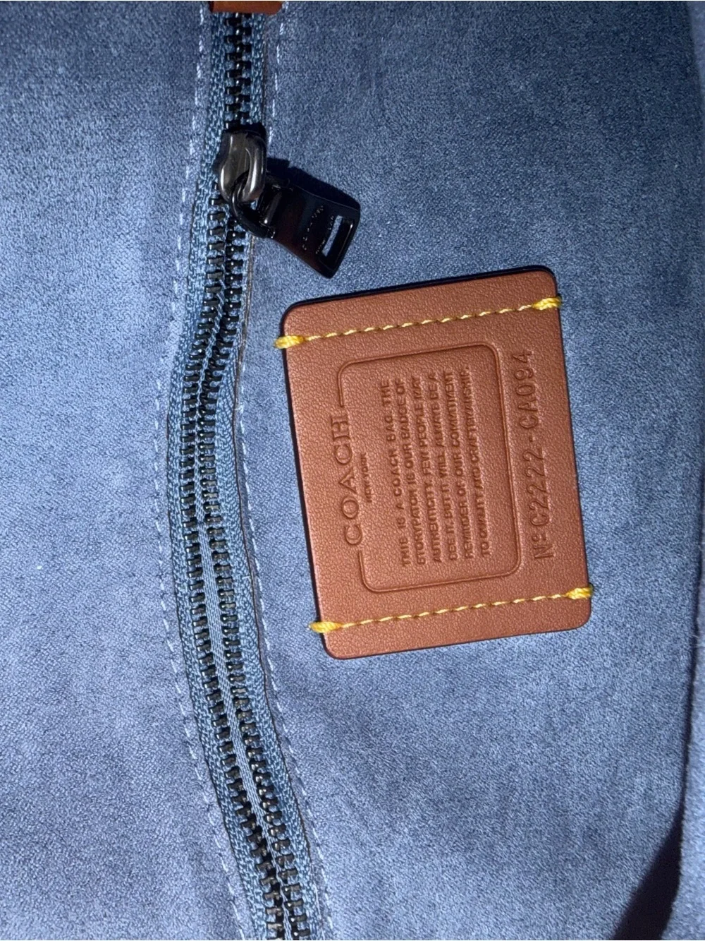 Coach compact pebbled